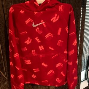 Red Nike hoodie for boys. Lightly used. Fits sizes 6-7